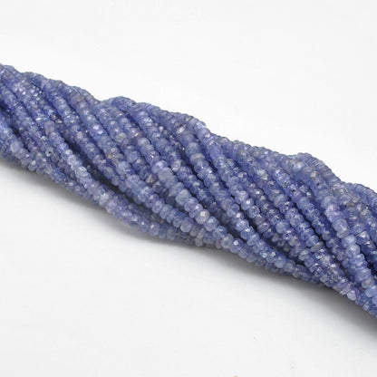 Tanzanite 4mm rondelle beads 16 inch strand overhead flat lay
