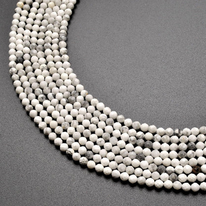 Natural white howlite round faceted beads wholesale scale reference