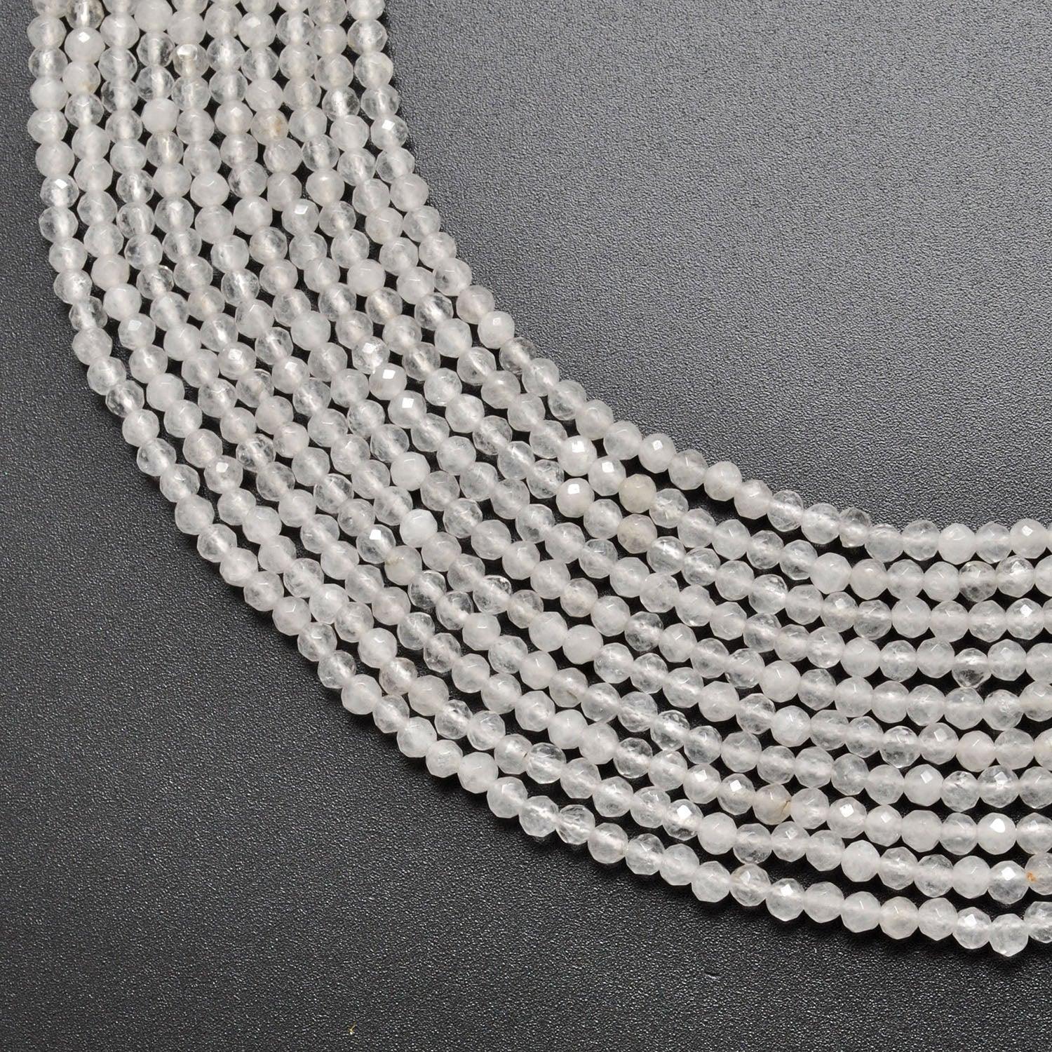 Natural white quartz round faceted beads 15 inch strand - front view