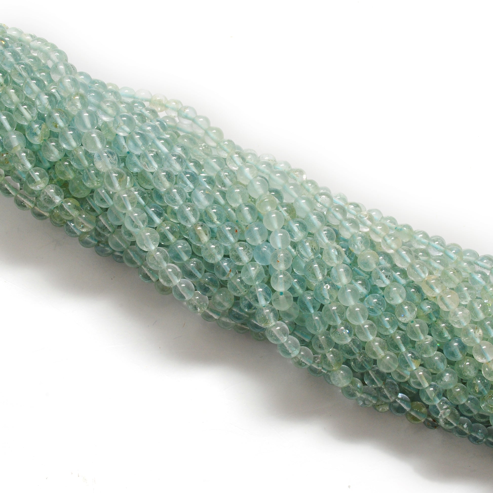 Ocean blue aquamarine beads 15 inch strand overhead flat lay