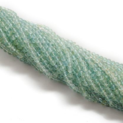 Ocean blue aquamarine beads 15 inch strand overhead flat lay