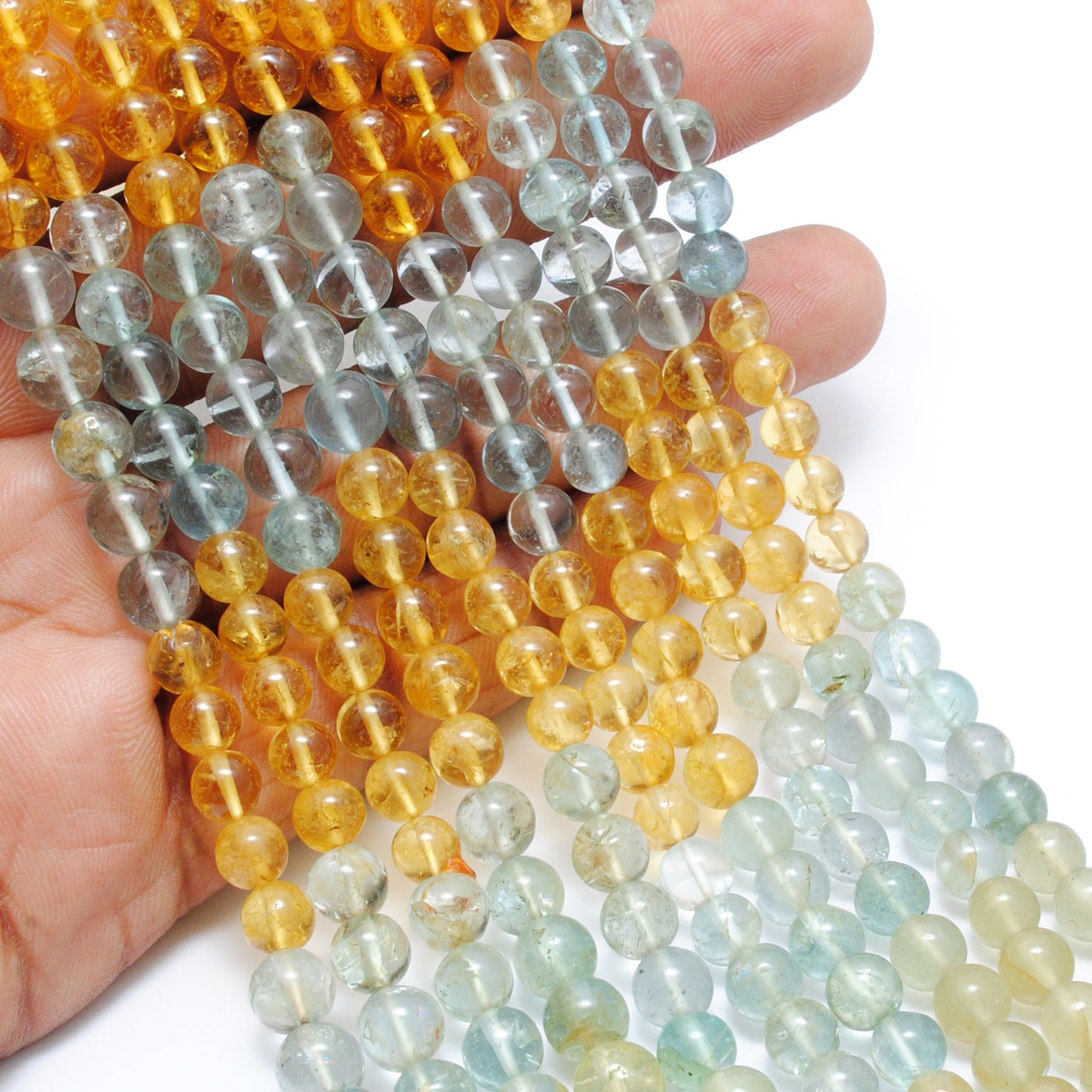Ocean tone aquamarine beads 15 inch full strand display
