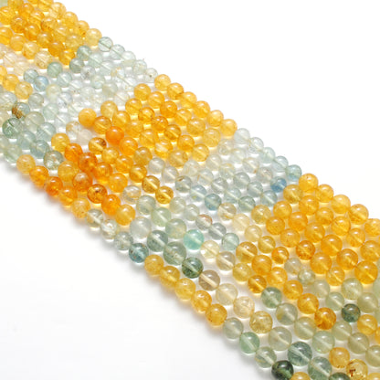 Ocean tone aquamarine beads 15 inch strand overhead flat lay