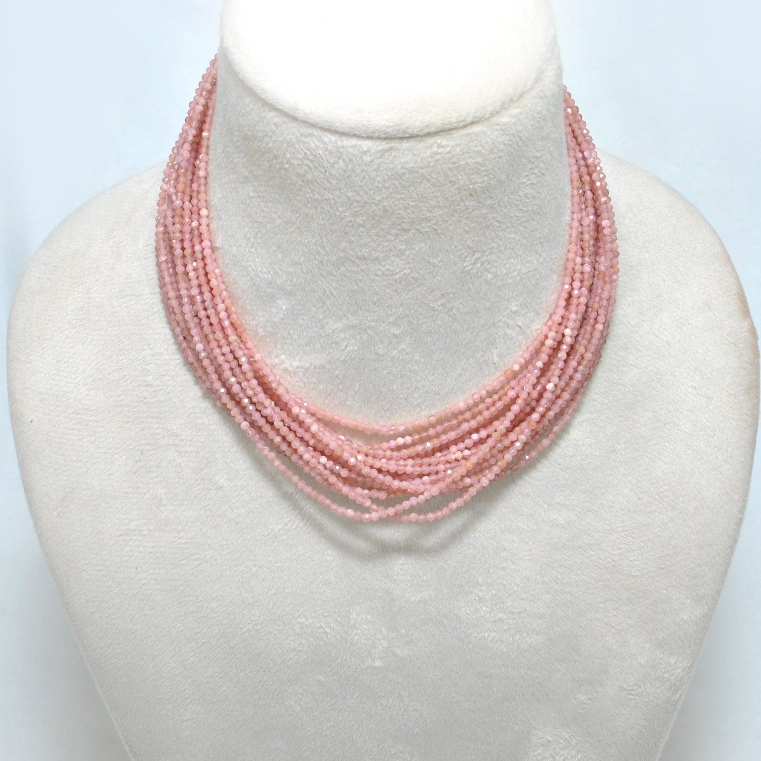 Peach moonstone round beads - close-up peachy glow adularescence