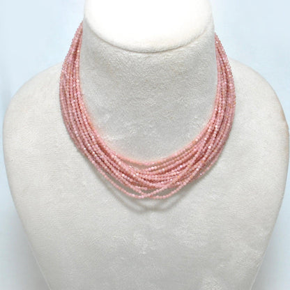 Peach moonstone round beads - close-up peachy glow adularescence