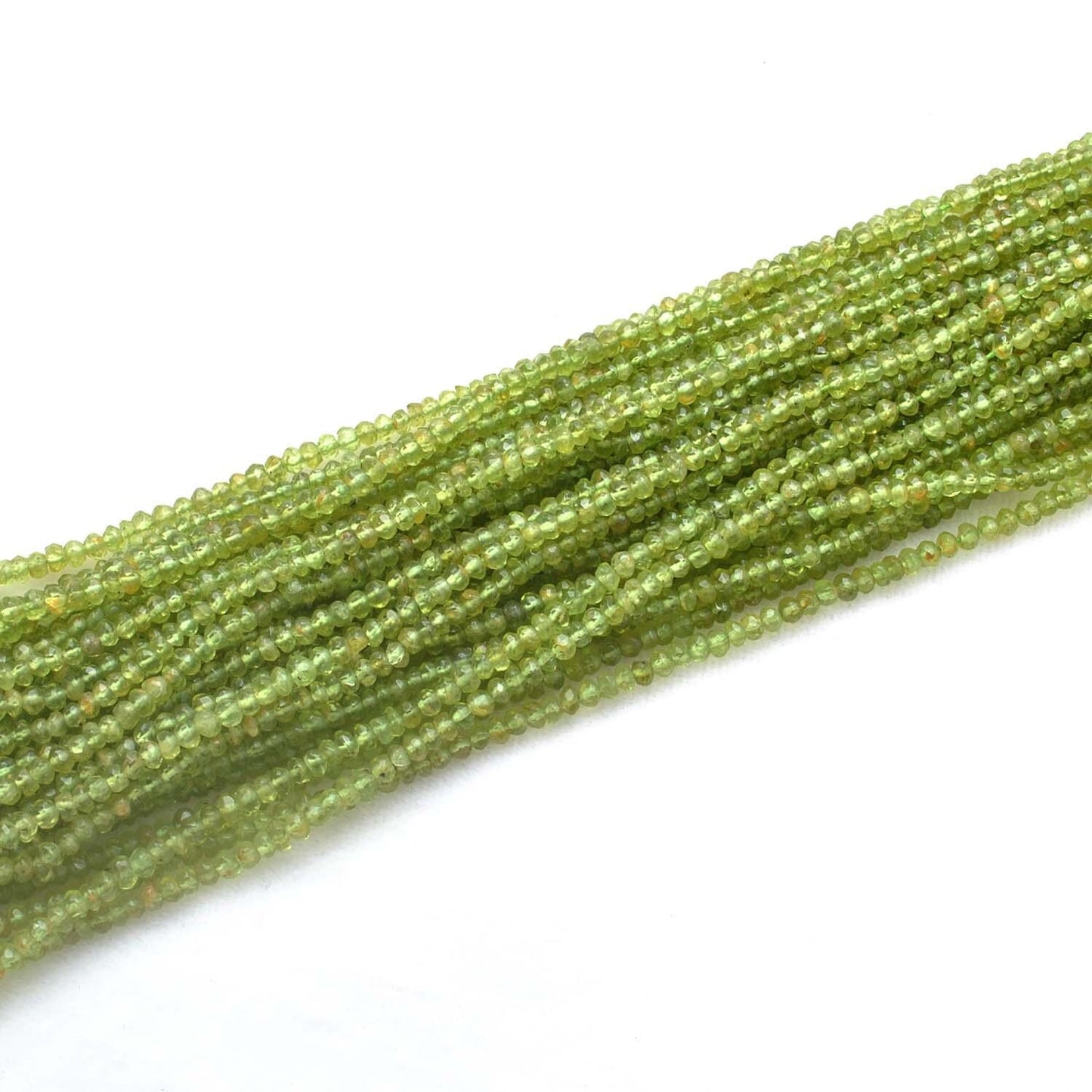 Peridot faceted rondelle beads - close-up vivid lime-green color