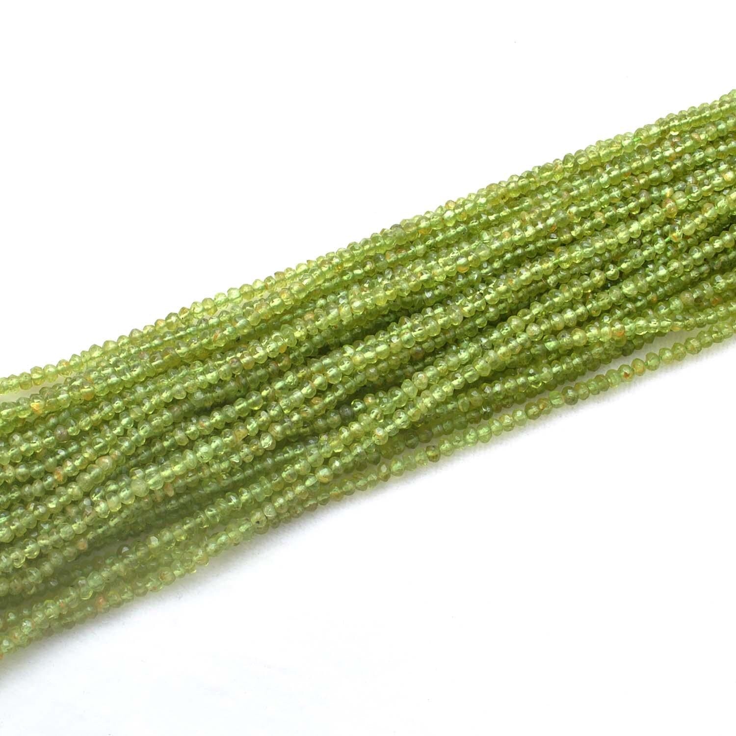 Peridot faceted rondelle beads - close-up vivid lime-green color