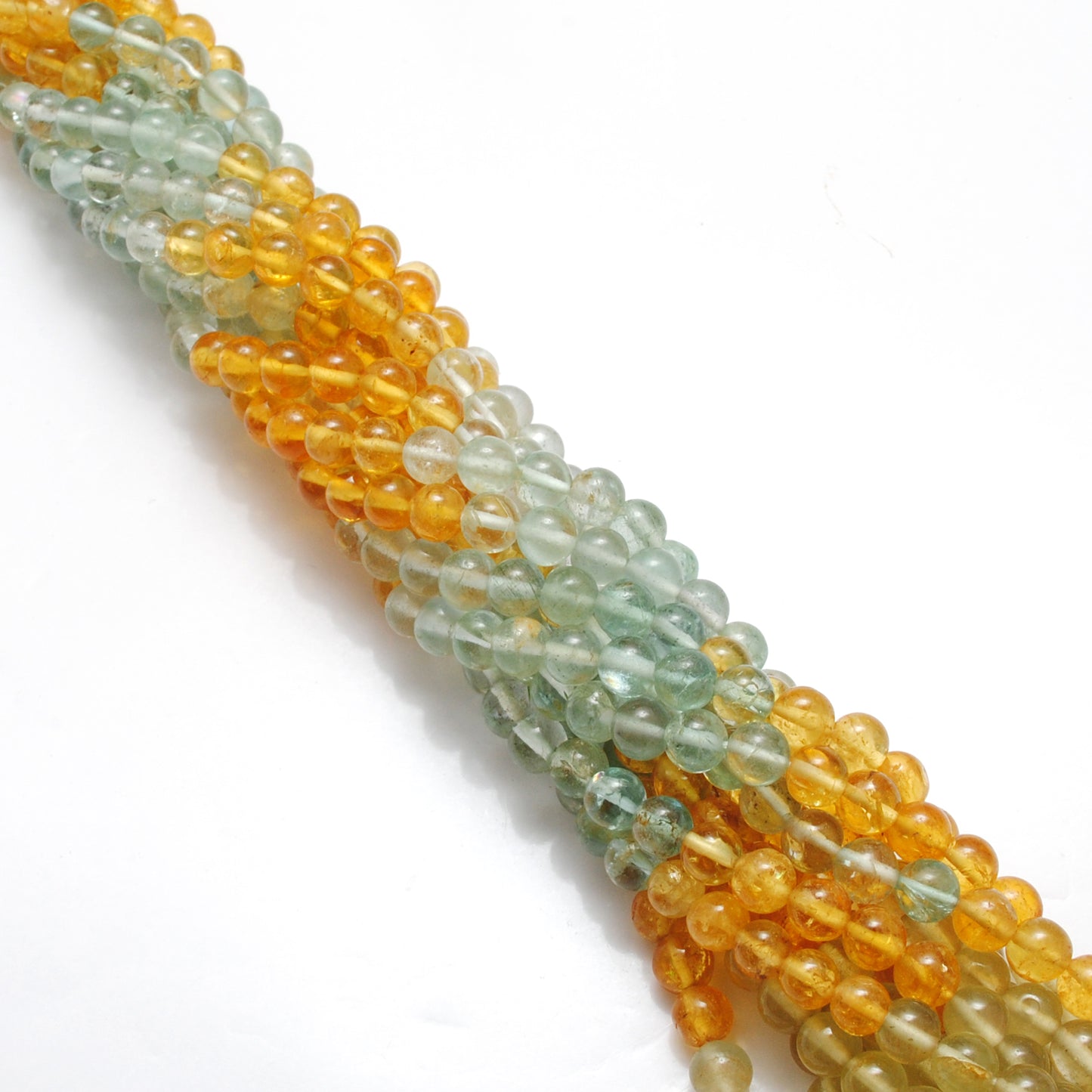 Premium aquamarine round beads 15 inch strand overhead flat lay