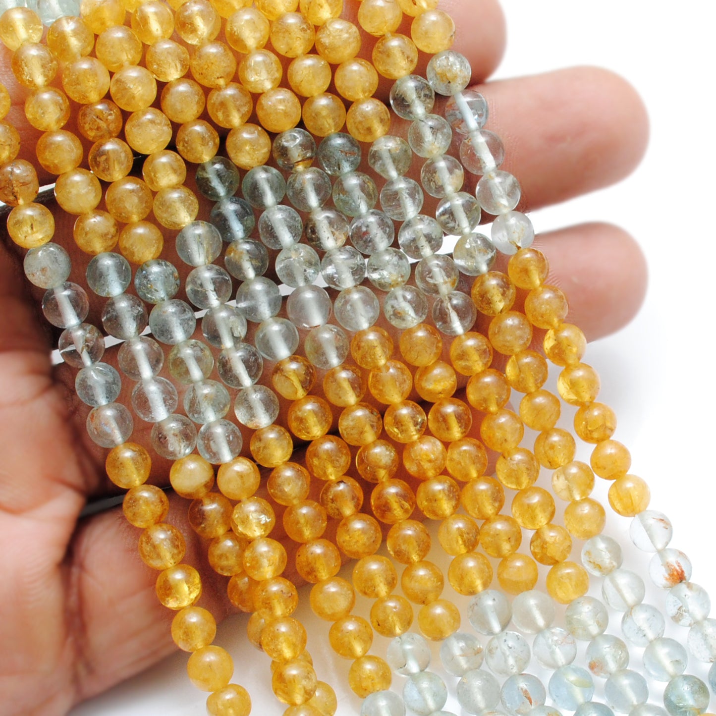Premium aquamarine round beads knotted strand display