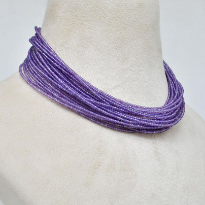 Purple amethyst faceted rondelle beads - close-up deep violet