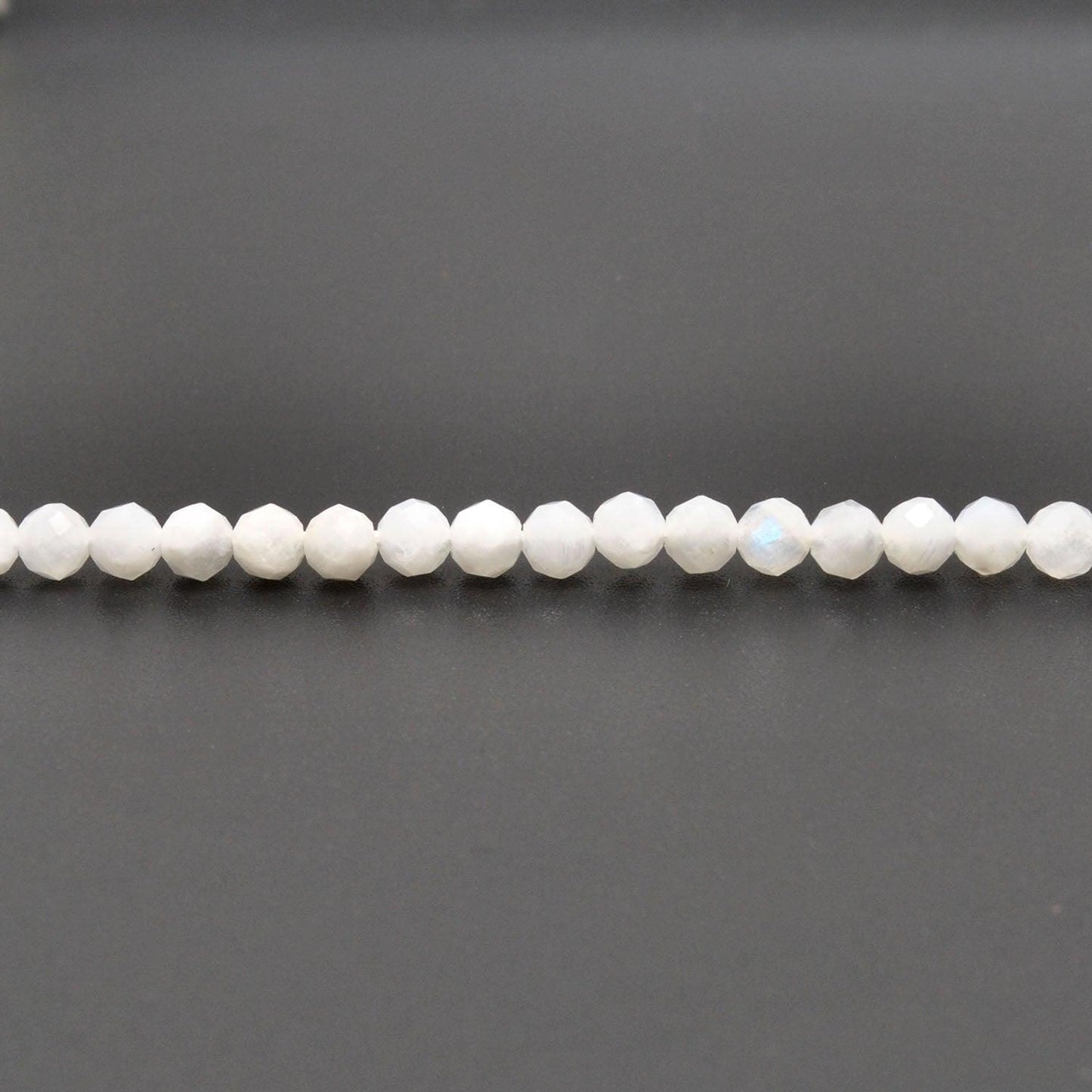 Rainbow moonstone faceted round beads for bridal jewelry - side