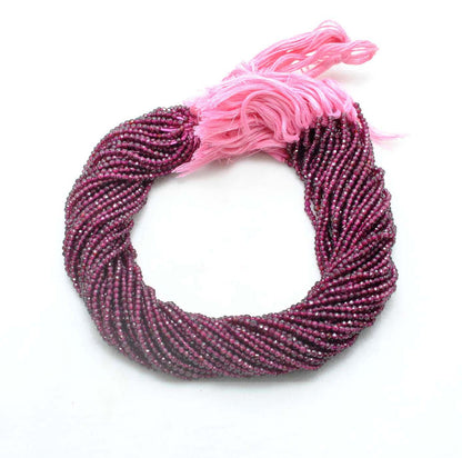 Red garnet rondelle beads - close-up deep crimson red faceted