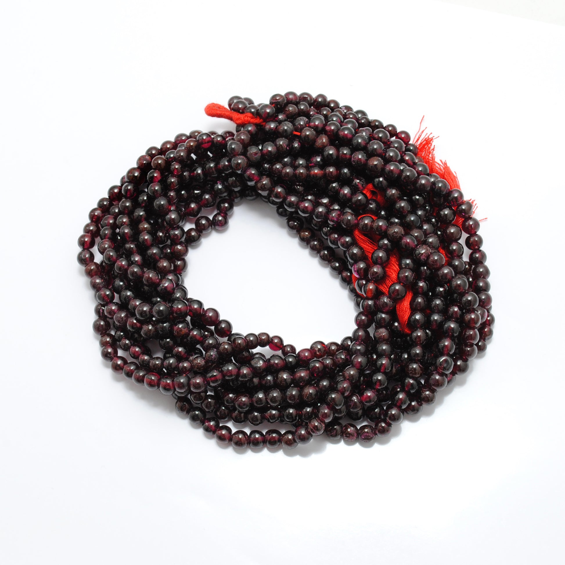 Rhodolite garnet round beads scattered loose - 5.5-6mm uniform size
