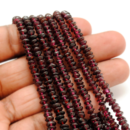 Natural rhodolite garnet button beads knotted strand display
