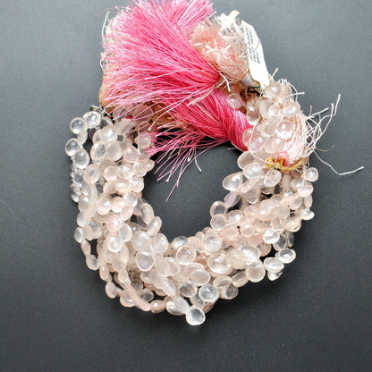 Rose quartz 8mm heart beads close-up romantic soft-pink sparkle