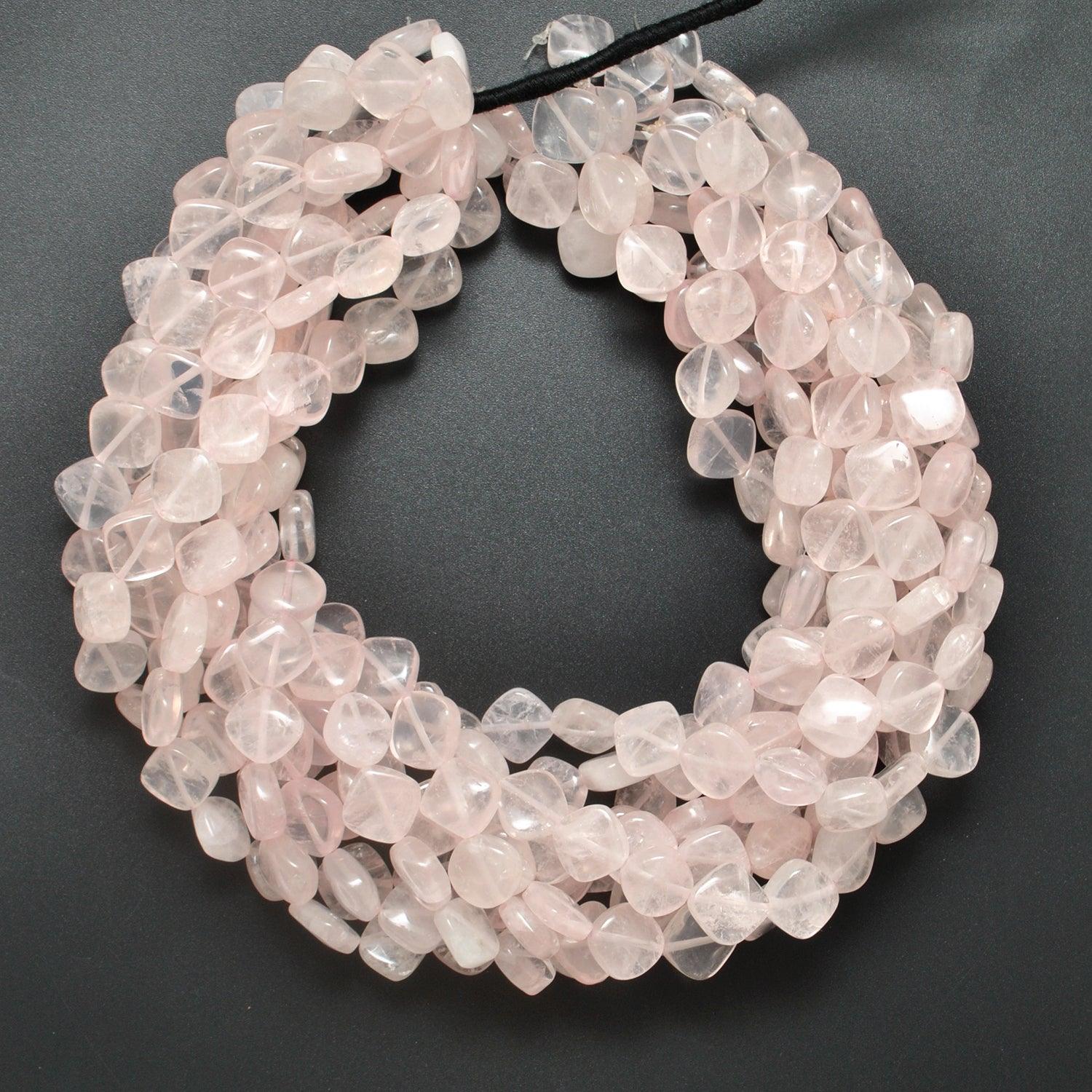 Rose quartz cushion beads close-up soft blush-pink colour