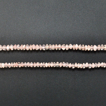 Rose quartz button beads Jaipur wholesale - scale reference