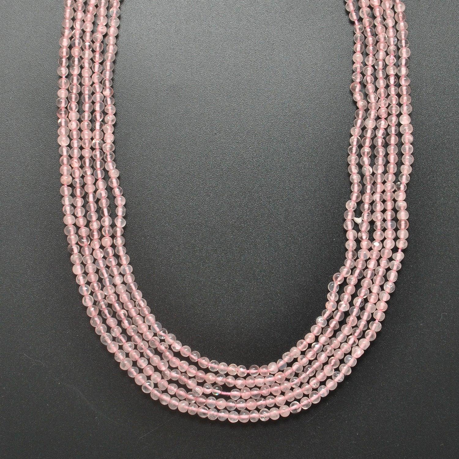 Natural rose quartz round beads close-up luster detail