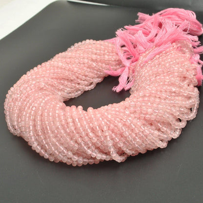 Rose quartz round beads Jaipur wholesale - scale reference