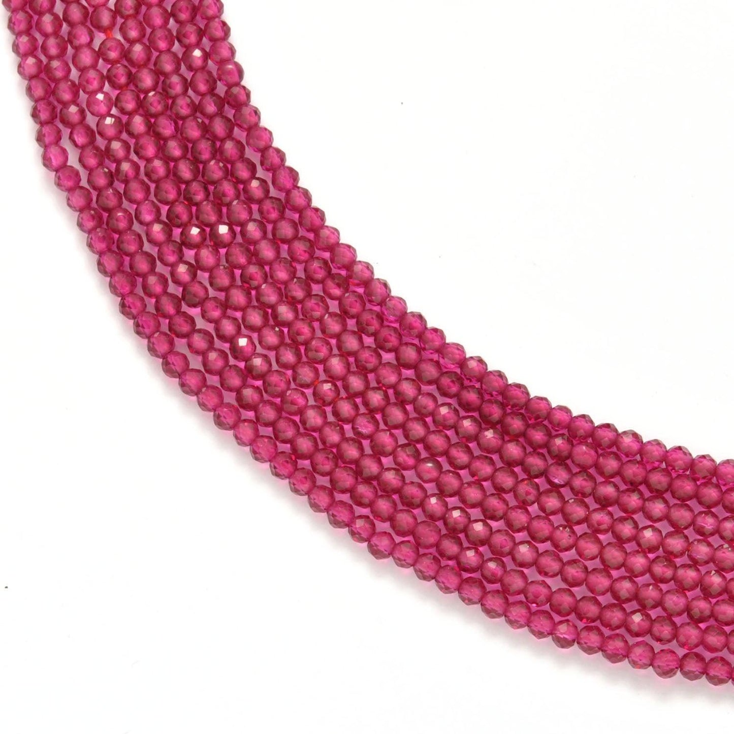 Ruby corundum round faceted beads 13 inch strand - front view