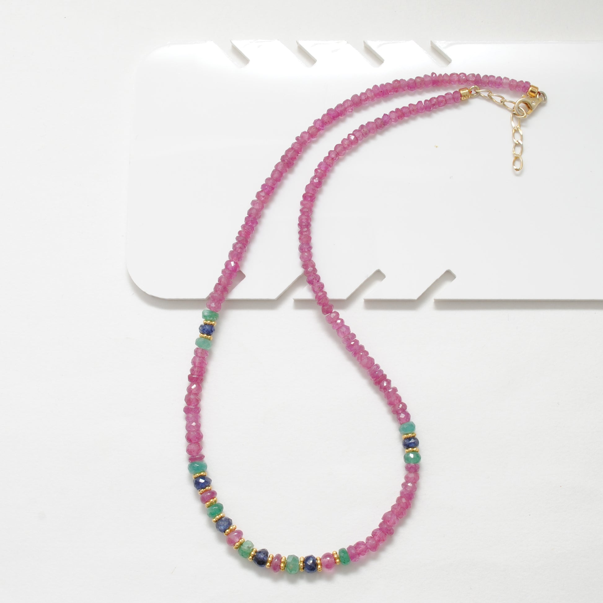 Ruby Emerald Sapphire Gold Beaded Necklace - Overhead View