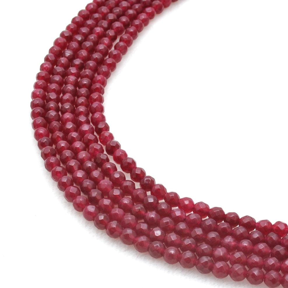 Ruby quartz round faceted beads 15 inch strand - front view