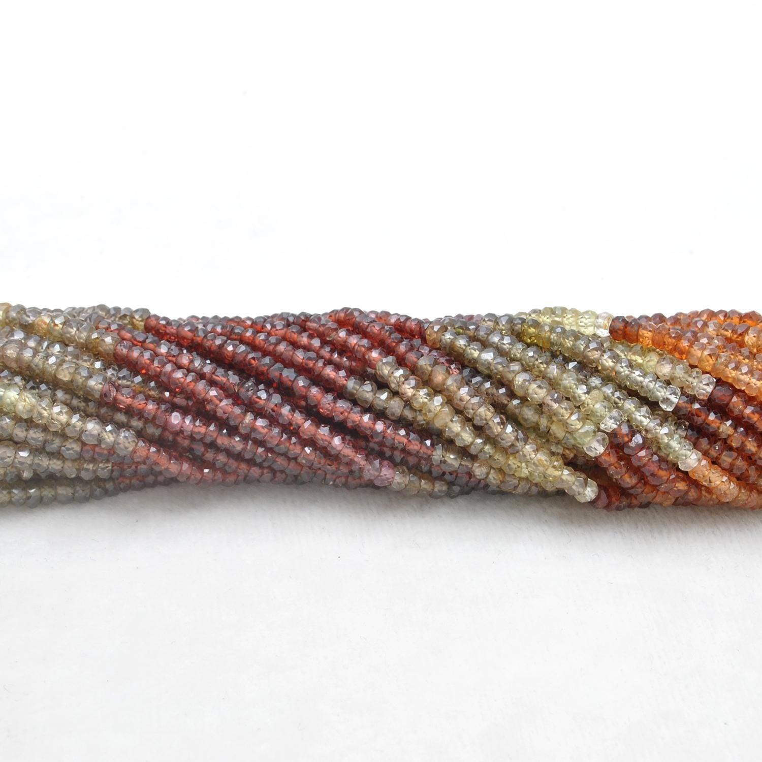 Sapphire rondelle beads scattered loose view Jaipur
