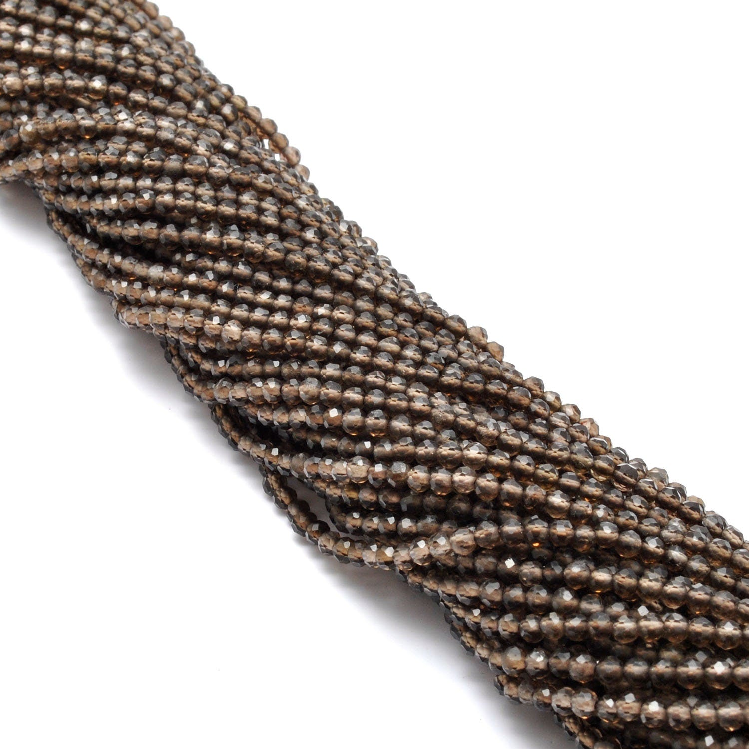 Smokey quartz faceted round beads scattered loose view