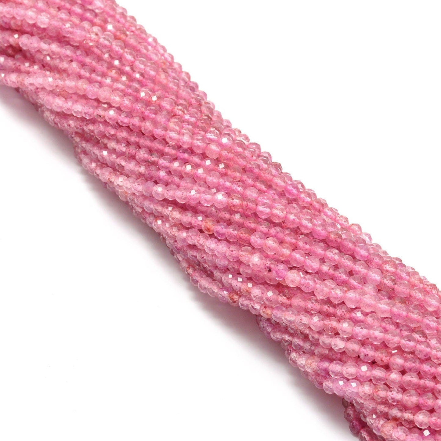 Strawberry quartz round beads scattered loose - unique speckled view