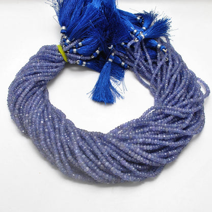 Tanzanite rondelle faceted beads close-up violet-blue colour