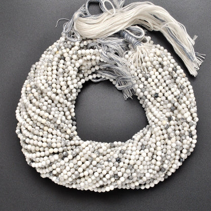 White howlite round faceted beads 12.5 inch strand - front view