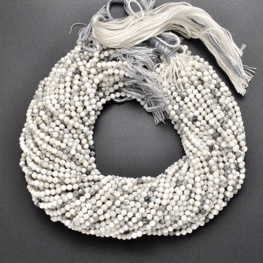 White howlite round faceted beads 12.5 inch strand - front view