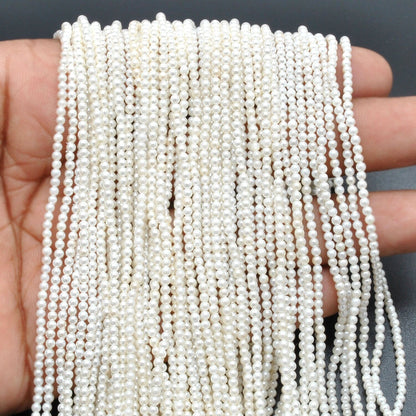 White shell pearl round beads close-up lustrous high-luster finish