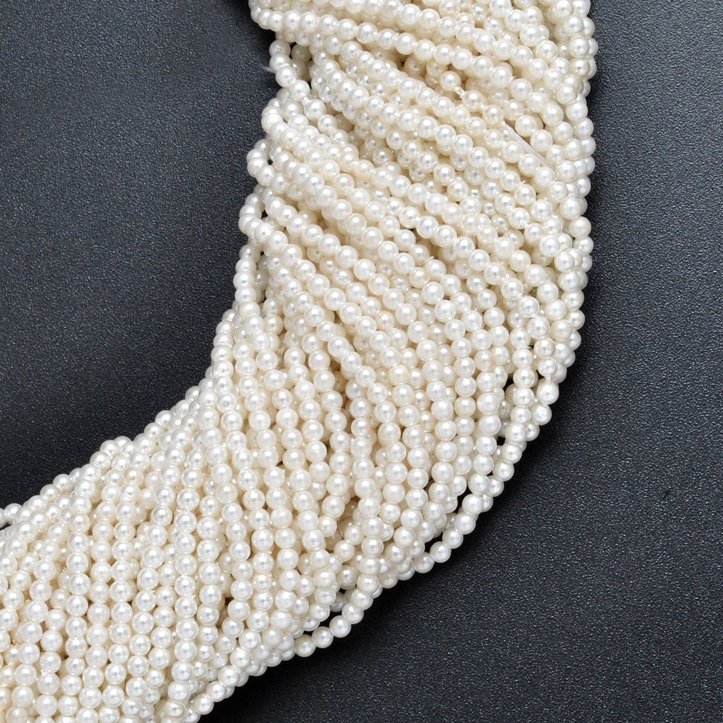 White shell pearl round beads scattered loose view