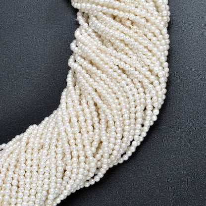White shell pearl round beads scattered loose view